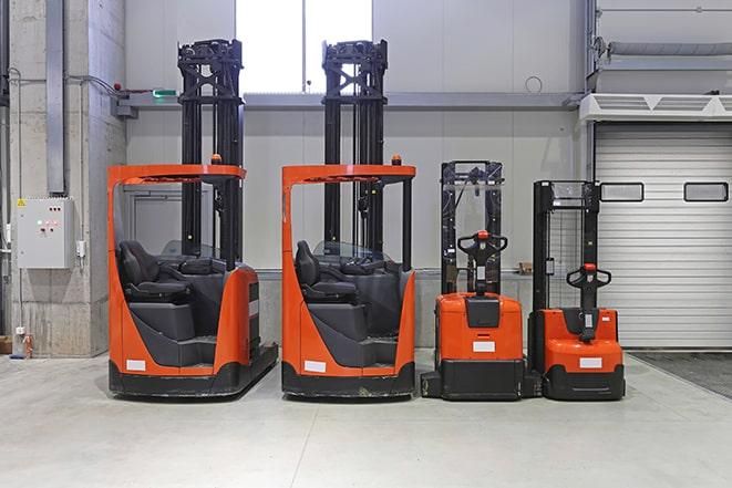 heavy-duty forklift machines in a row